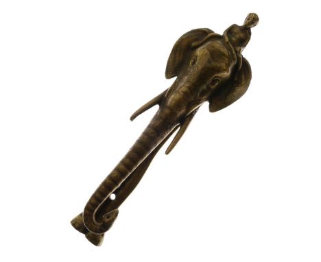 Cast brass door knocker modelled as an elephant with figure perched atop, the rear section inscribed 'Africa', 18cm high  