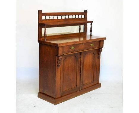 Late 19th Century walnut chiffonier with balustrade over mirror back and turned columns, the lower section with single drawer