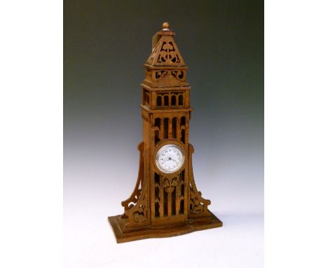 Early 20th Century oak mantel timepiece with silvered Arabic dial housed in a light oak architectural case, 44cm high  
