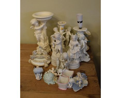 Selection of ceramic angels to include; lamp bases, wall pockets, salts, etc  