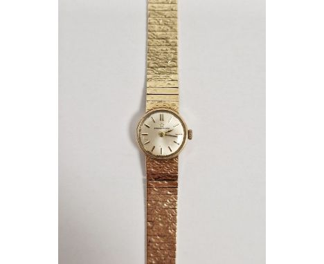 Ladies Eterna-Matic 9ct gold manual wind wristwatch, the circular dial with raised gilt baton markers denoting hours, housed 