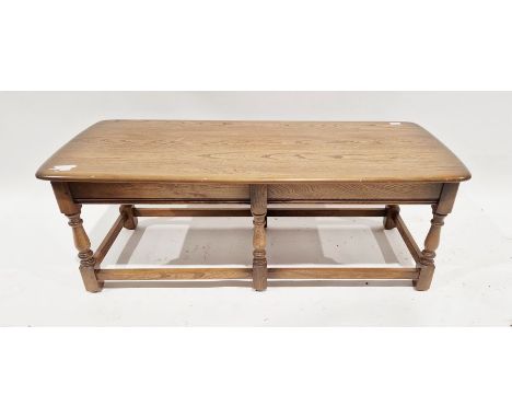 Mid 20th century Ercol rectangular coffee table&nbsp;on turned supports united by stretchers, 41cm high x 112cm long x 48cm w