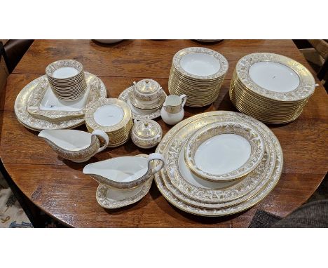Wedgwood 'Gold Florentine' pattern bone china part dinner service&nbsp;printed with gilt borders of griffins, scrolls and vas