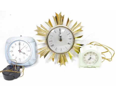 Smiths bakelite cased electric "Sectric" mantel clock,&nbsp;a similar wall clock, being housed in a blue case and a Kienzle&n