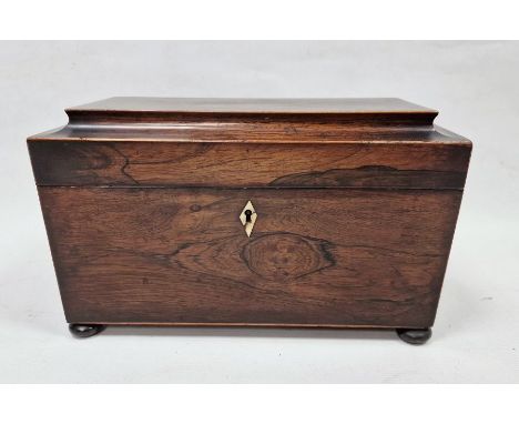 19th century rosewood sarcophagus-shaped tea caddy&nbsp;with two-compartment interior and mixing bowl, hoop handles and bun f
