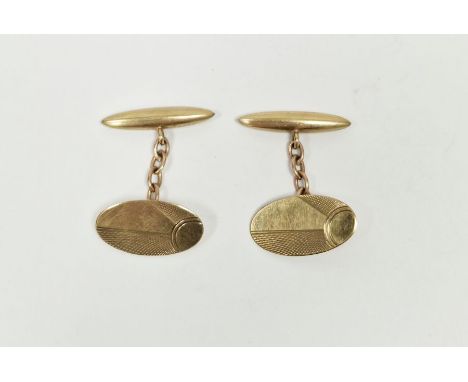 Pair 9ct gold cufflinks&nbsp;with oval engine-turned and bar end, 4.9g approx.&nbsp;