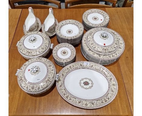 Wedgwood 'Florentine' pattern bone china part dinner service, printed and moulded with border of scrolls, vases and winged be