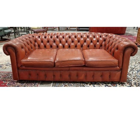 Three-seater Chesterfield settee&nbsp;in button upholstered brown leatherette&nbsp;Condition ReportLight surface scratches an