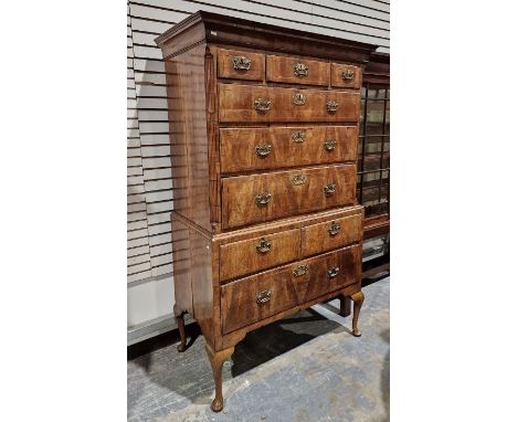 Early 18th century walnut chest on stand, the top with cavetto cornice, three short drawers above three graduated drawers, al