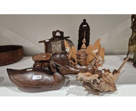 Assortment of wooden wares and related collectables to include a novelty wooden birdcage, Chinese hardwood stand, a carved wo