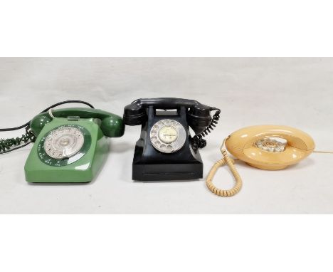 Three vintage telephones&nbsp;including a black cased example (3)&nbsp;