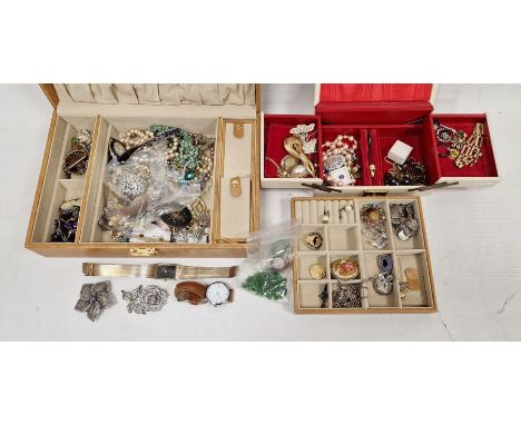 Two boxes of costume jewellery&nbsp;to include a gold-coloured pendant, heart-shaped pendant, silver and enamel brooch of a p