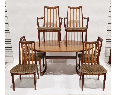 G-Plan teak dining suite viz:- oval extending dining table on end standard supports and set of six matching railback dining c