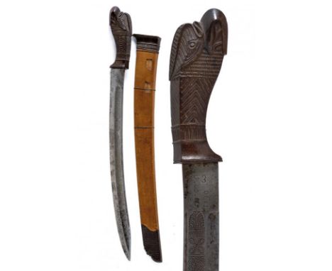 dating: circa 1900 provenance: Giava, Curved, single-edged blade with groove and fuller, engraved with floral and geometrical