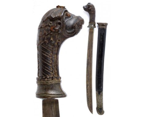 dating: Late 19th Century provenance: Sumatra, Slightly curved, single-edged blade, in fine pamor. Fine, horn hilt, embossed 