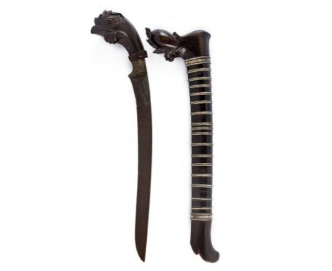 dating: circa 1900 provenance: Sumatra, Single-edged blade, in pamor, with short rear groove. Horn grip, embossed with a bird