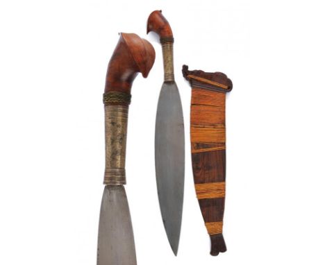 dating: circa 1900 provenance: The Philippines, Wide and strong, single-edged, leaf-shaped blade, wooden, chiselled grip, wit