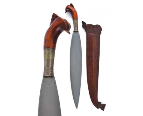 dating:  provenance: The Philippines, Wide and strong, single-edged, leaf-shaped blade; wooden, chiselled grip (parts missing