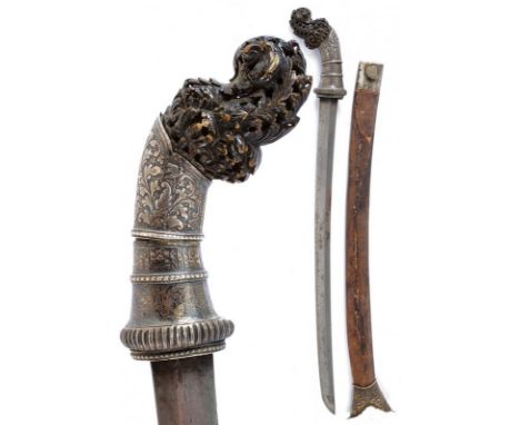 dating: Late 19th Century provenance: Sumatra, Curved, single-edged blade. Horn grip, richly embossed with fine, silver mount