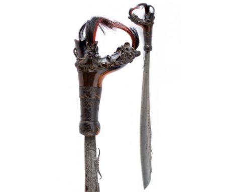 dating: Late 19th Century provenance: Kalimantan, Single-edged blade, with chiselled and pierced back, base with two curls an