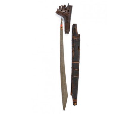 dating: circa 1900 provenance: Kalimantan, Blade of typical shape, in pamor. Wooden, embossed grip, base covered with vegetab