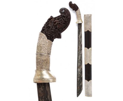 dating: 20th Century provenance: Sumatra, Strong, single-edged blade, in fine pamor. Horn grip, richly embossed with floral m