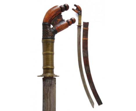 dating: 19th Century provenance: Kalimantan, Curved, single-edged blade, in pamor. Wooden grip with two-tip pommel and brass 