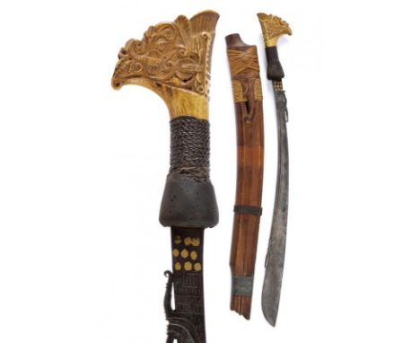 dating: End of 19th beginning of 20th Century provenance: Kalimantan, Slightly curved, single-edged blade, chiselled and pier