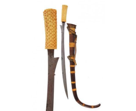 dating: circa 1900 provenance: Sumatra, Slightly curved, single-edged blade with a rest and small carving at the base. Ivory 