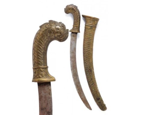 dating: First half of the 20th Century provenance: Indonesia, Curved, single-edged blade. Grip and scabbard completely covere