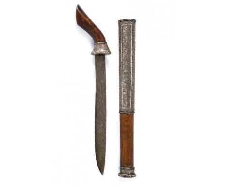 dating: early 20th Century provenance: Giava, Single-edged blade, in fine pamor. Wooden grip with silver, engraved ring-nut. 