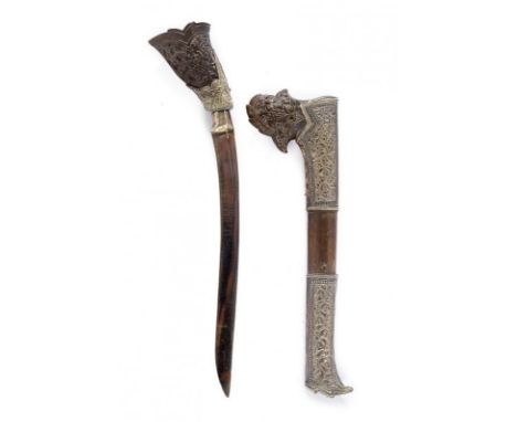 dating:  provenance: Sumatra, Single-edged blade. Horn grip, richly embossed, with silver, decorated base. Wooden scabbard wi