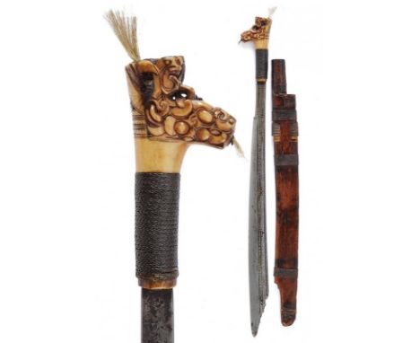 dating: Late 19th Century provenance: Kalimantan, Fine blade of typical shape, with chiselled tip at the back, floral engravi