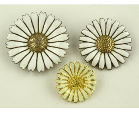 3 Scandinavian silver and enamel flowerhead brooches.
