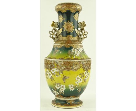 A large Japanese painted and gilded ceramic vase, height 57cm.