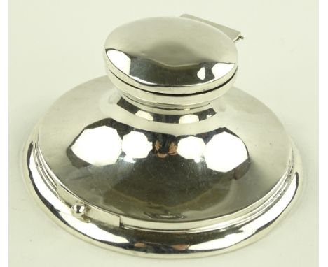 An unusual Edwardian silver Capstan inkwell, with integral drawer for postage stamps in the base, by Deakin & Francis, Birmin