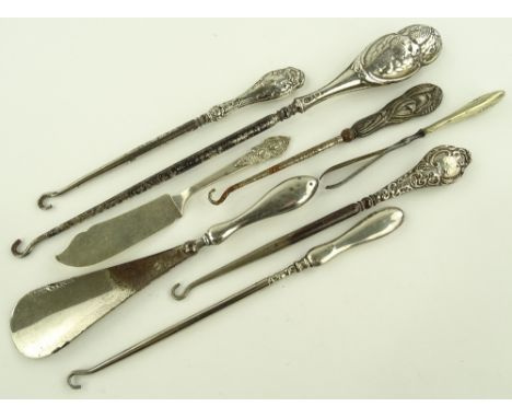 Silver handled button hooks, shoe horns, etc.