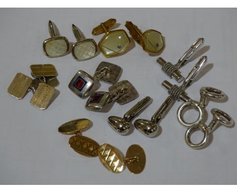 8 Pairs of cufflinks.