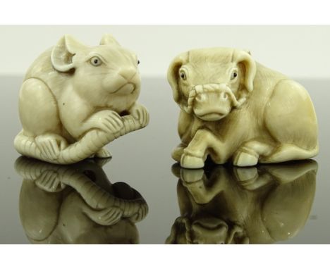 2 Chinese carved ivory buffalo and rat design netsuke, circa 1900, signed, length 4cm, (2).