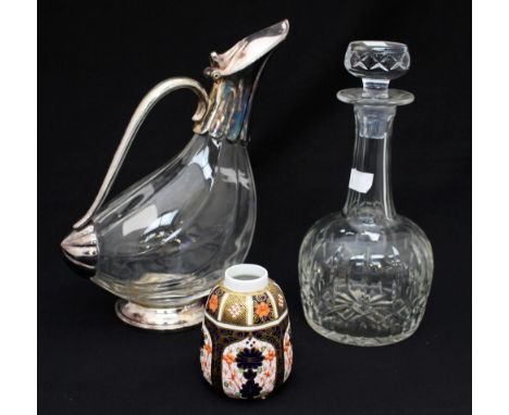 A claret jug with silver plated mounts together with a decanter a/f, and a small Royal Crown Derby jar, no lid (3) 