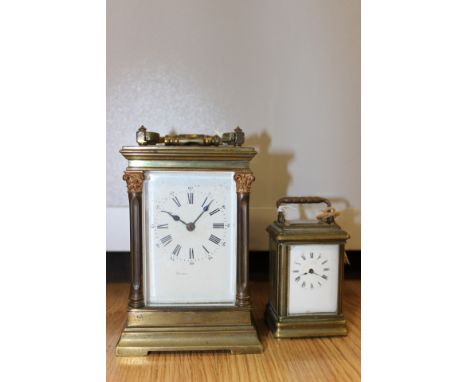 A 19th Century brass carriage clock, fitted with bevelled edge glass to top, front, side and back, together with a miniature 
