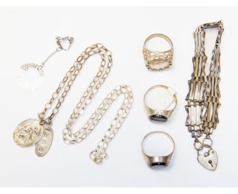 A collection of silver jewellery to include a gate bracelet, chain and pendants, three rings, etc (7) 