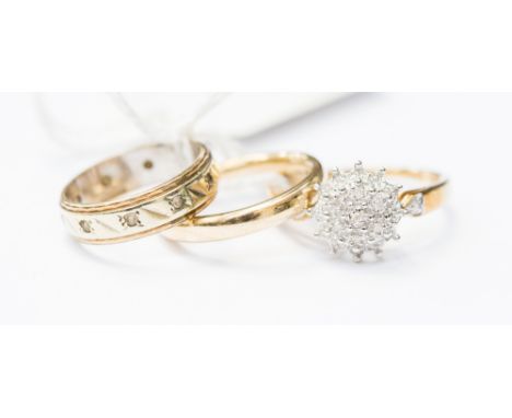 A 9ct gold diamond cluster ring, a 9ct gold band with white chips, together with a 9ct gold band, sizes J, K and P, wwith a c