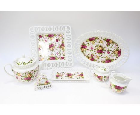 Royal Albert Old Country Roses, Pierced Collection, comprising cream and sugar, small tray, square platter, pierced clock, te
