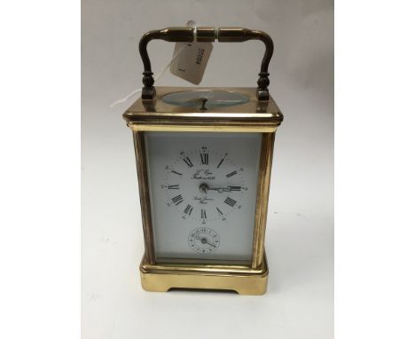 A brass L'Epee Carriage clock, Roman numerals to white dial with key (1)