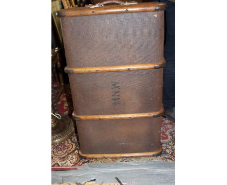 An early 20th Century canvas and wood bound cabin trunk, bearing initials 'M.N.W'