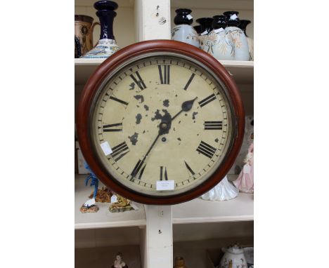 A mahogany cased wall clock with Roman numerals to dial, with pendulum and key 