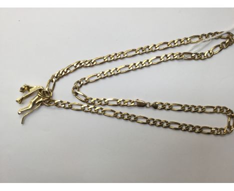 A 9ct gold heavy Figaro link chain along with a 14ct gold panther pendant set with white and red stones, with a combined tota