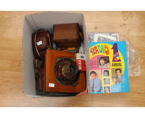 A Thornton Pickard mahogany plate camera, with tripod, Halina Achromat camera, Zeiss Ikon camera cased, Kodak Box Brownie cam