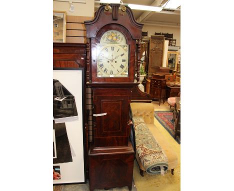 An early 19th Century mahogany eight day longcase clock, the dial inscribed 'William Smith, Huddesfield', the hood with a swa